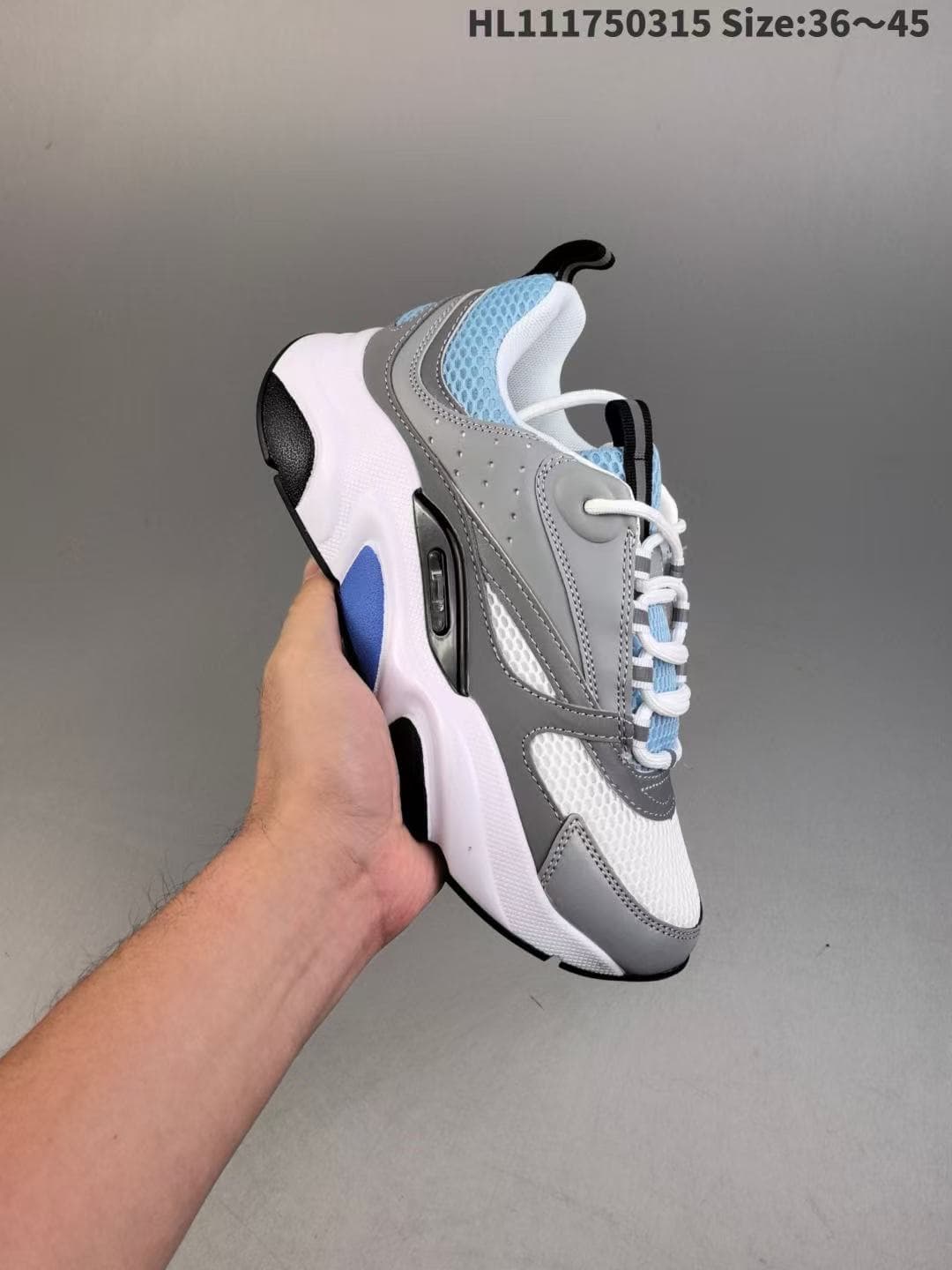 Chaussures basses de sport et de loisirs B22 en cuir et maille avec bride à logo pour homme