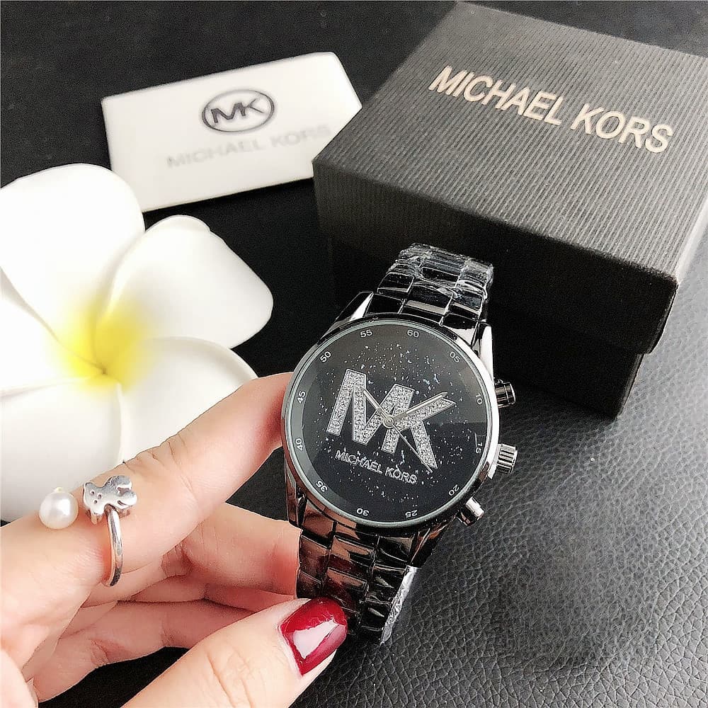 Classique Vente Chaude Femmes D'affaires Loisirs Montre À Quartz Simple Bande D'acier Plein Ciel Cadran Étoile