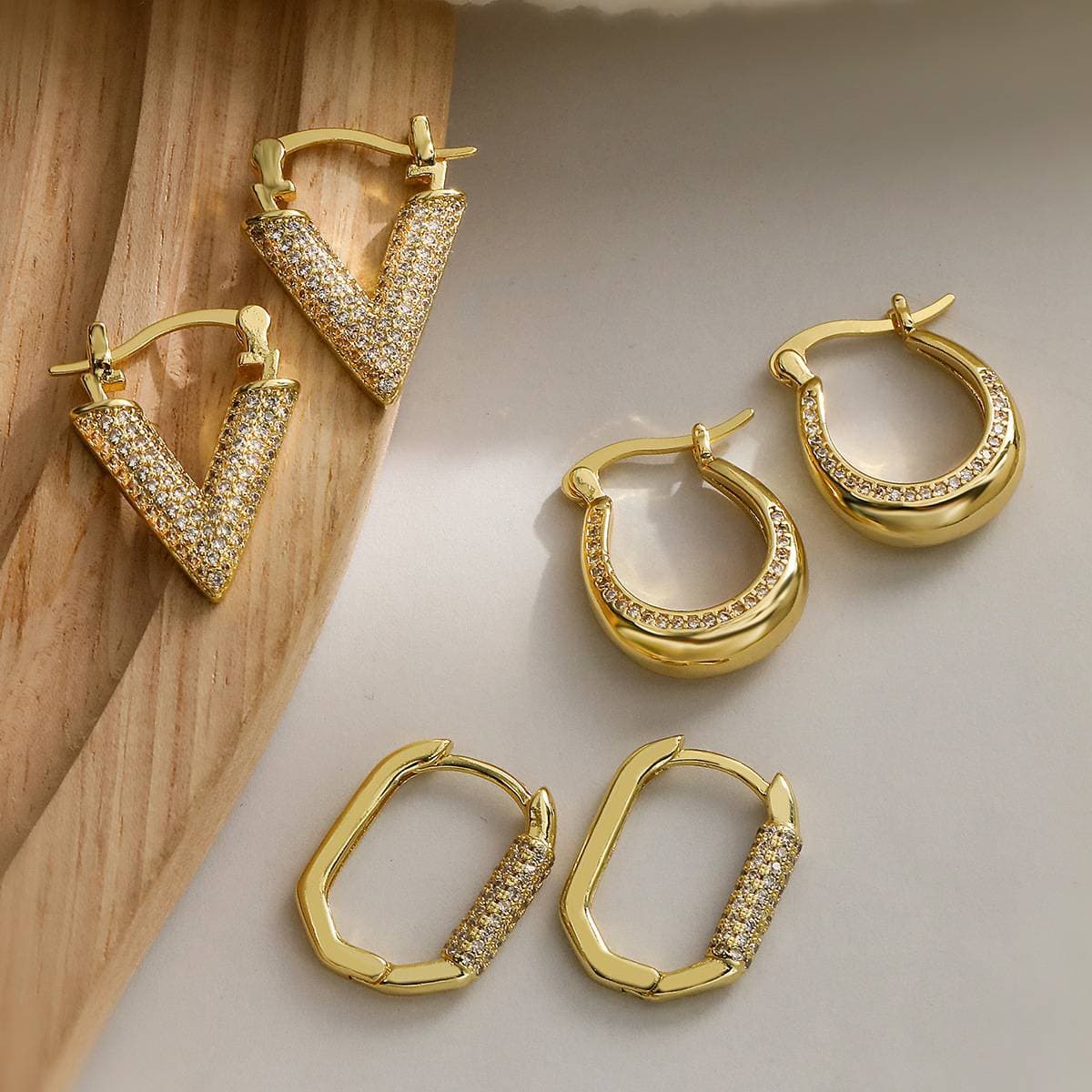 Designer INS style fashion exquisite irregular geometric zircon earrings for women Europe and the United States small luxury luxury high-end earrings