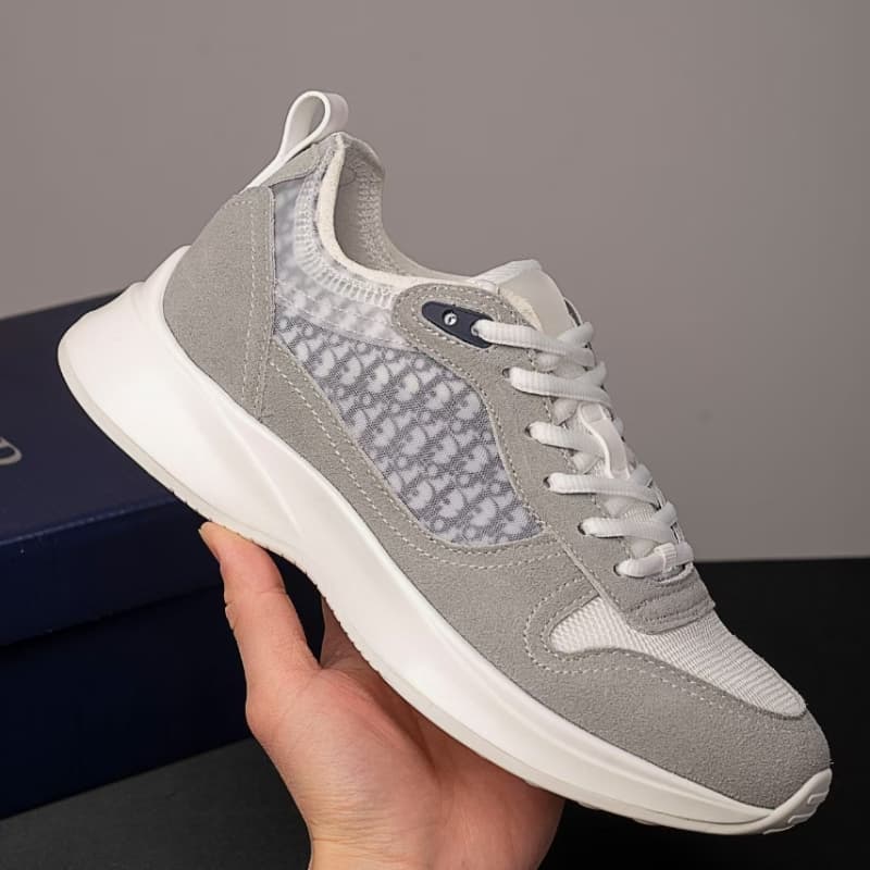 Nouvelles chaussures de course décontractées à imprimé lettre B25 avec brides à bout rond, tendance et confortables pour hommes et femmes.