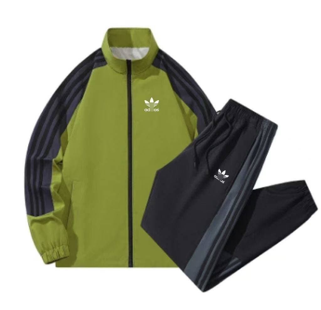 Ensemble de survêtement décontracté pour homme, composé d'une veste zippée à col montant et d'un pantalon de jogging, avec bandes latérales.