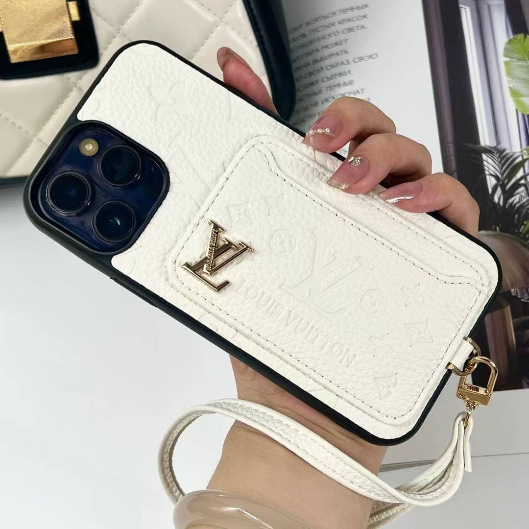 Le nouvel étui en cuir avec dragonne est compatible avec les iPhone 15, Pro, Max, 13, 12 et 14 pouces.