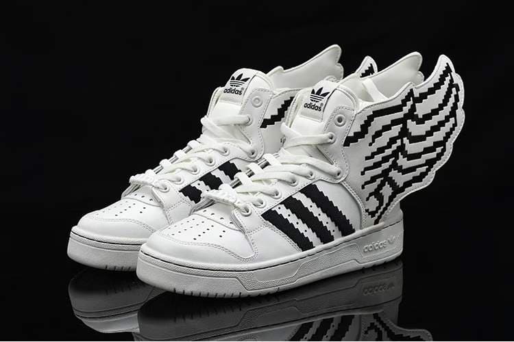 Baskets montantes pour homme, style streetwear, en cuir, à lacets, ornées d'ailes de mode