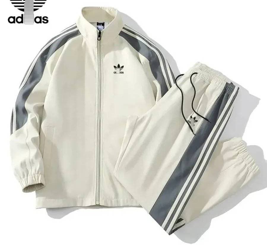 Ensemble de survêtement Adidas pour homme, composé d'une veste à col montant zippée et d'un pantalon de jogging, idéal pour le sport, la salle d