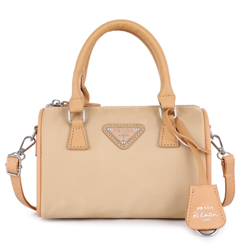 Classique rétro grandes dames rondes en nylon sac pour femmes triangle étiquette bandoulière sac à main épaule éclatée net rouge mêmes modèl