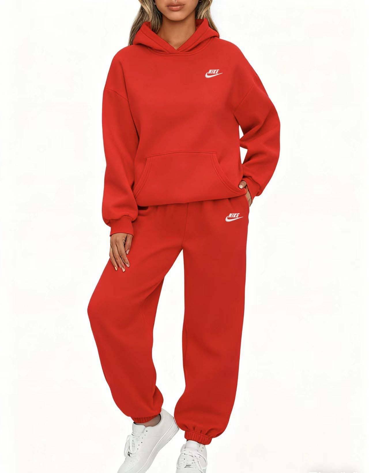 Ensemble décontracté deux pièces NIKE pour femme, composé d'un sweat à capuche à manches longues avec poche et d'un pantalon de jogging assorti