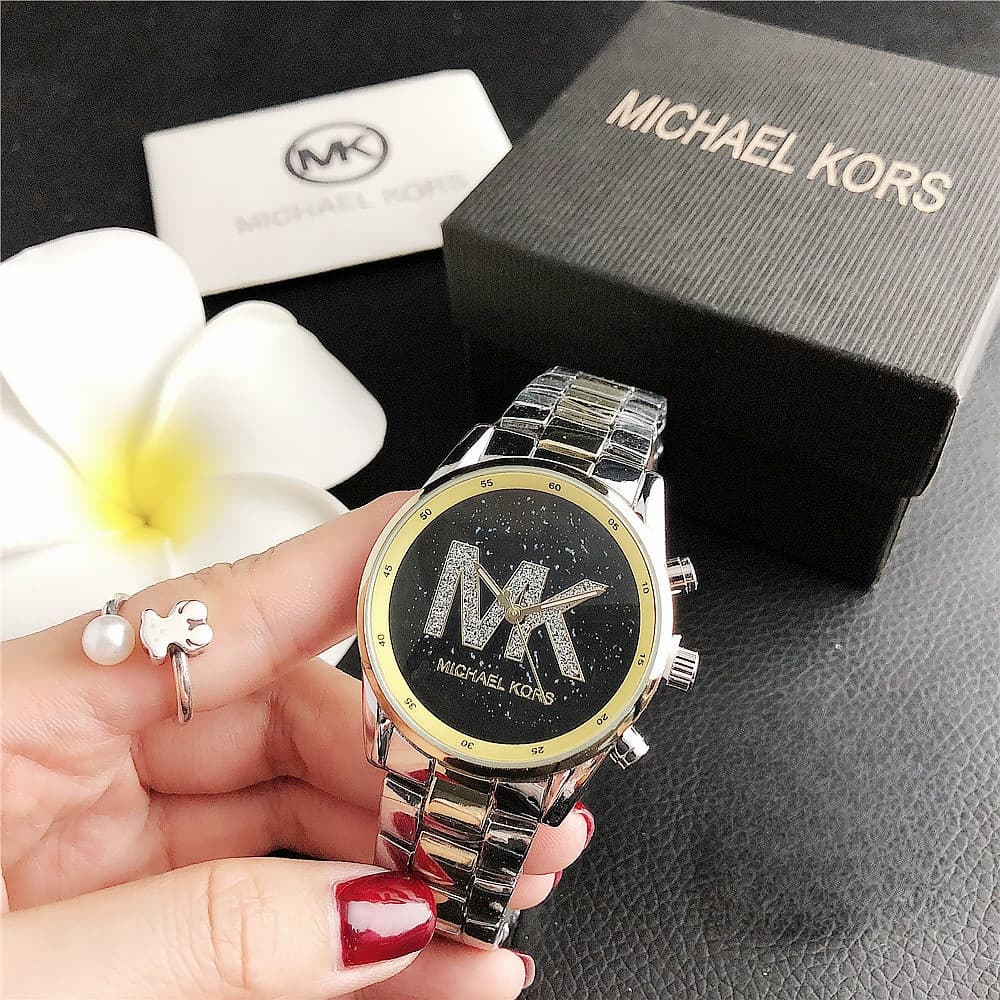 Classique Vente Chaude Femmes D'affaires Loisirs Montre À Quartz Simple Bande D'acier Plein Ciel Cadran Étoile