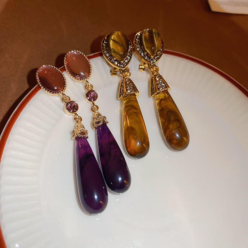 Designer style diamond inlaid resin water drop earrings, artistic retro light luxury long earrings, antique style earrings