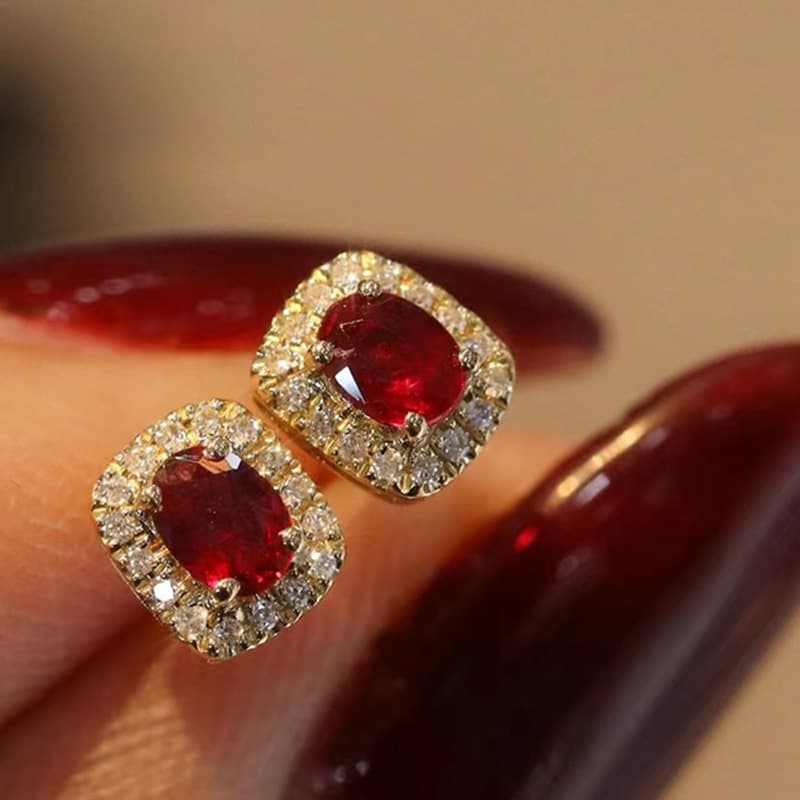 Cao Shi's new earrings Hepburn style red corundum Zircon Earrings luxury accessories