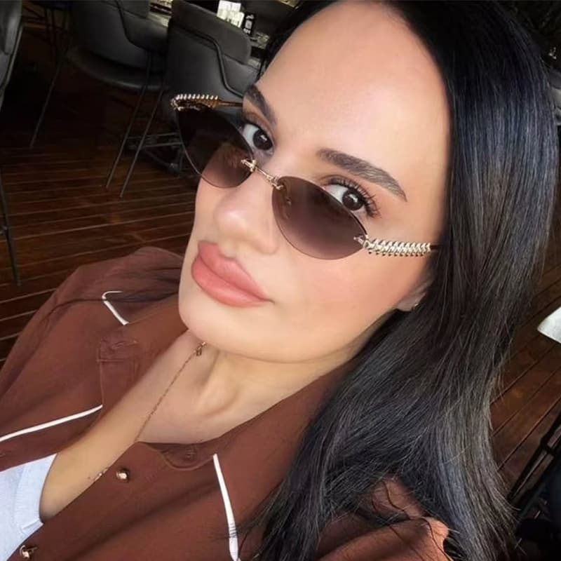 Metal Style Fashion Cat Eye Sunglasses Women's High-end Sense Frameless Sunglasses Personalized Threaded Glasses Legs