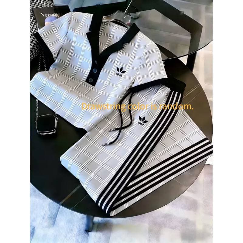 Ensemble deux pièces pour femme : polo imprimé 3D, pantalon large à manches courtes et color block.