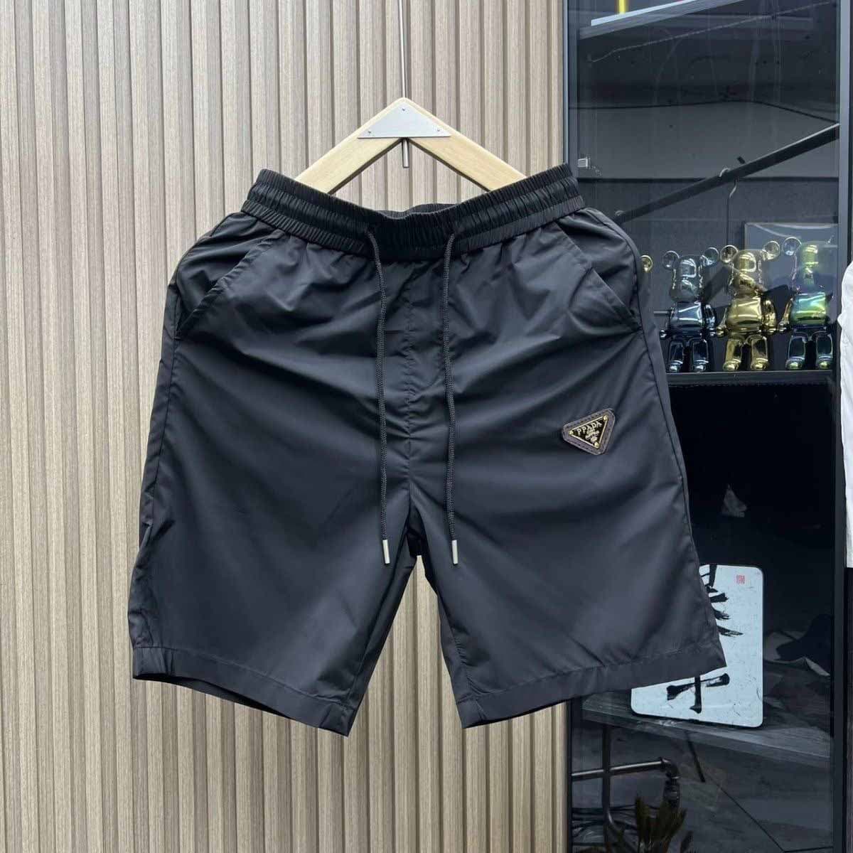 Short de sport décontracté haut de gamme pour homme, tendance, à séchage rapide, polyvalent, fin, coupe cinq points, idéal pour l'été.