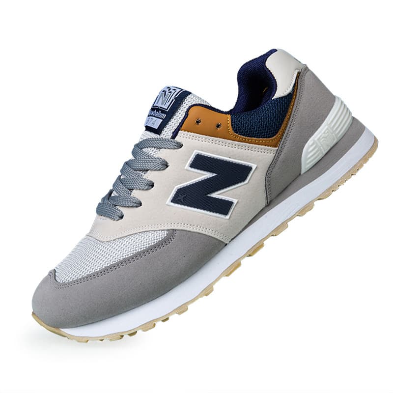 Nouveau modèle 574 Couple Casual Live Fashion Trend N-Word Sports Chaussures de course 2025