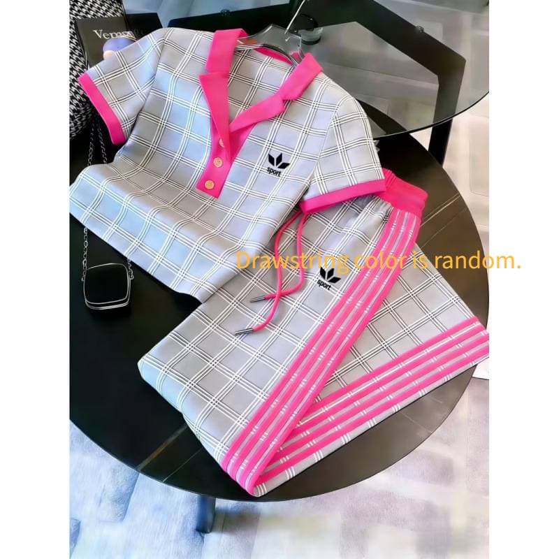 Ensemble deux pièces pour femme : polo imprimé 3D, pantalon large à manches courtes et color block.