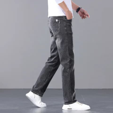 Jeans homme haut de gamme à jambes larges, coupe droite et ample, idéal pour le printemps et l'automne. Pantalon décontracté et tendance, élasti