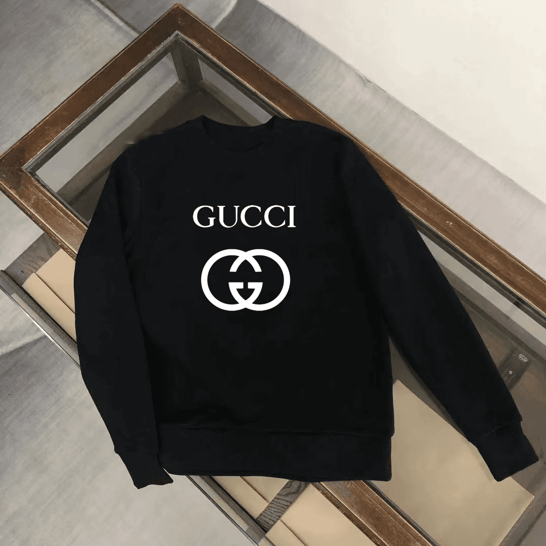 Sweat à capuche noir classique pour homme, collection 2024. Pull à manches longues ample, style décontracté et sportif.