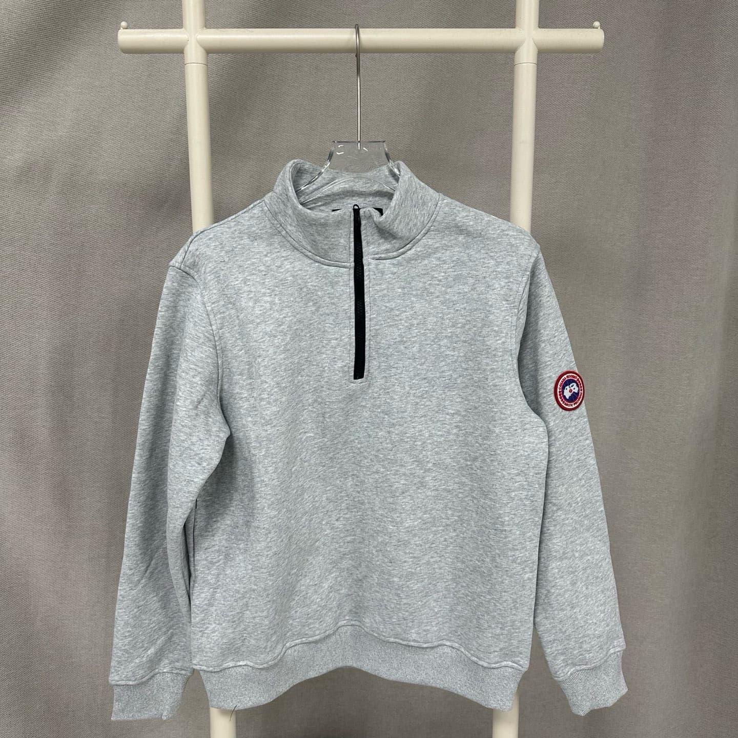 Pull polaire unisexe à manches longues et demi-zip couleur unie avec badge Canada 2025