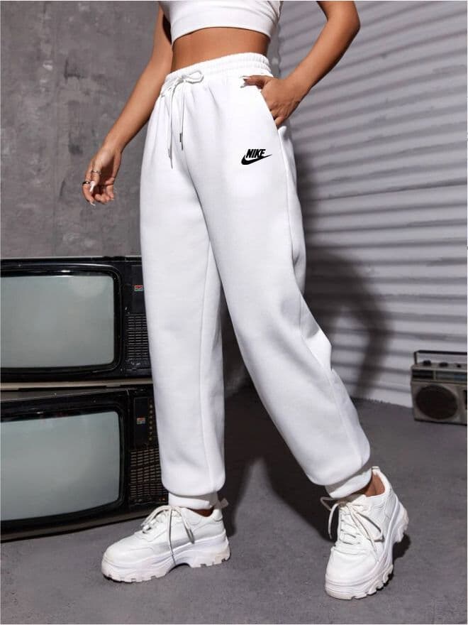 Pantalon de sport Nike printemps-automne pour femme, collection Europe et États-Unis, coupe slim et élastique, idéal pour le fitness et la course