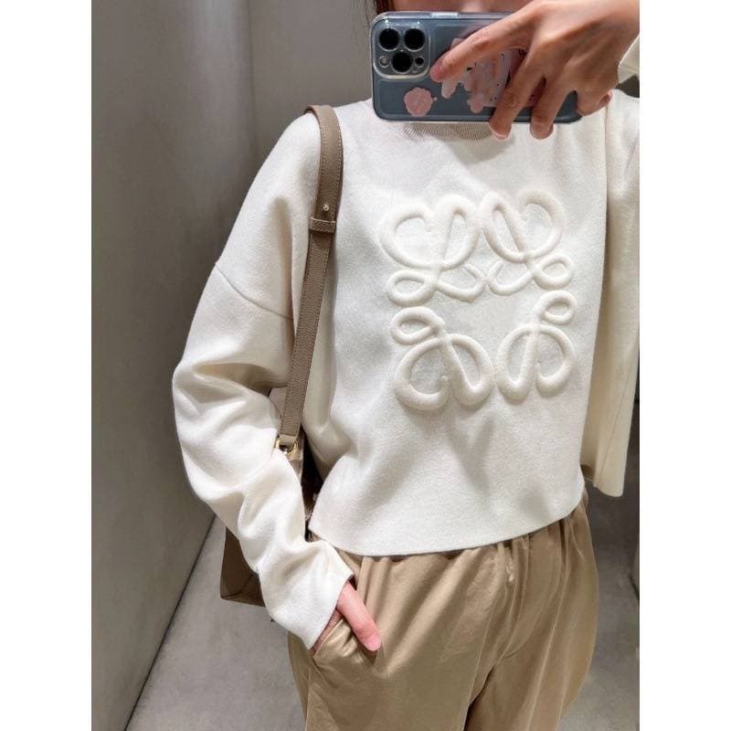 Pull en laine blanc gaufré pour femme