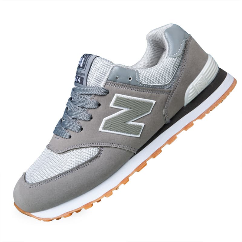 Nouveau modèle 574 Couple Casual Live Fashion Trend N-Word Sports Chaussures de course 2025