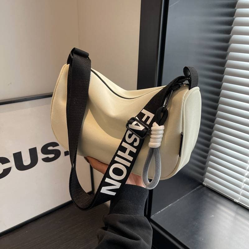 Designer fashion trend waterproof Oxford cloth large capacity dumpling bag crossbody bag female niche new all-in-one casual sports wind shoulder bag