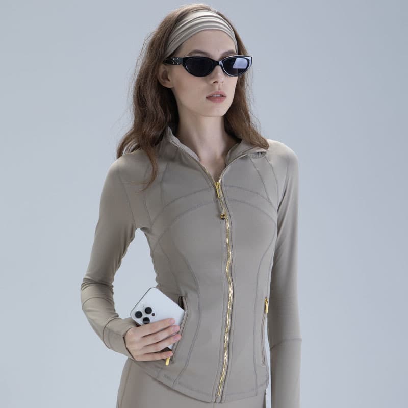 Veste de yoga slim à col montant pour femme – Haut de sport à manches longues avec fermeture éclair dorée, respirant et extensible pour la cour