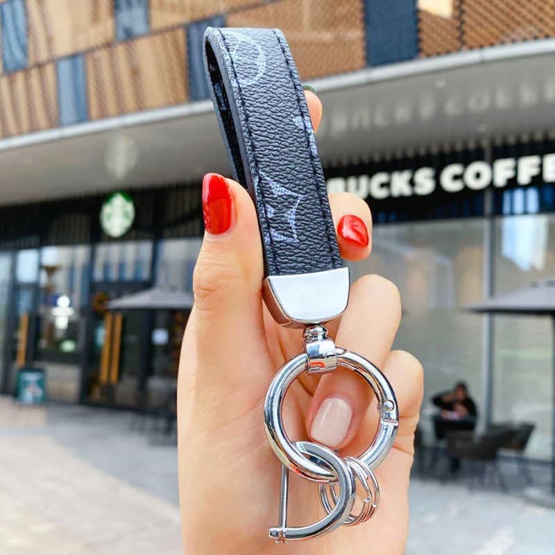 Porte-clés en cuir pour homme avec boucle de ceinture, pendentif pour clés de voiture, anneau tendance pour couple, cadeau créatif G1019