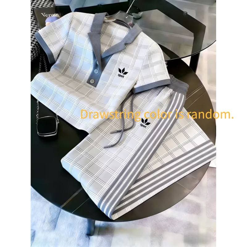 Ensemble deux pièces pour femme : polo imprimé 3D, pantalon large à manches courtes et color block.