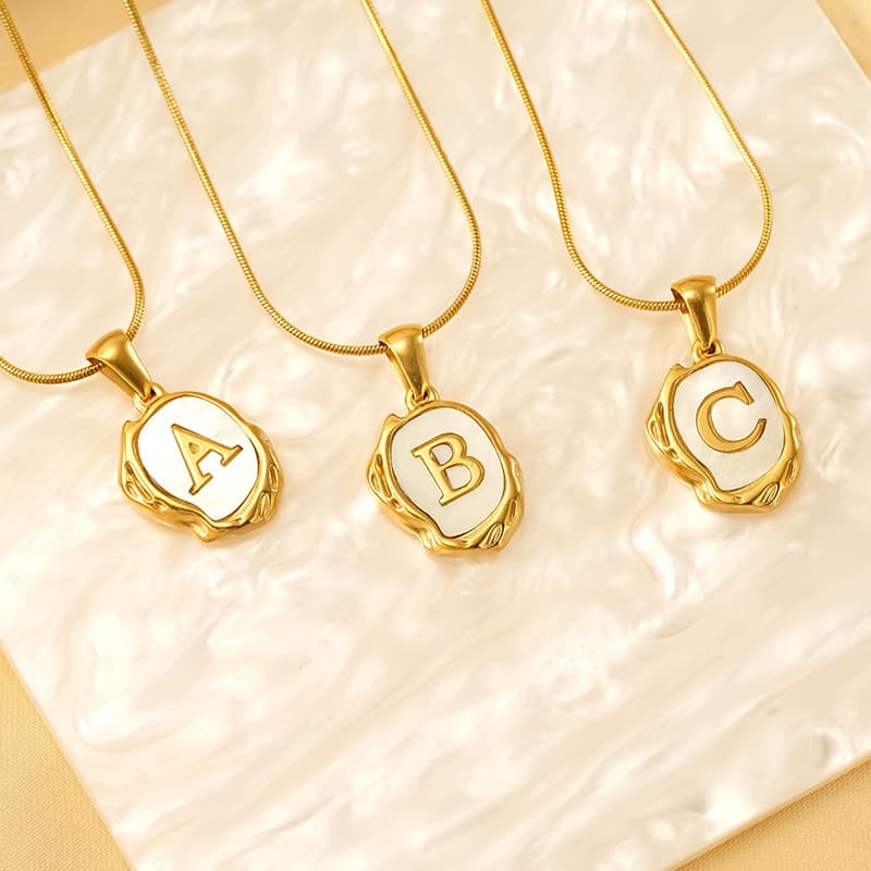 Women's Jewelry - Elegant Titanium Steel Shell Letter Pendant Necklace With 18K Gold Plated Lava Design, Minimalist Style For Everyday Wear