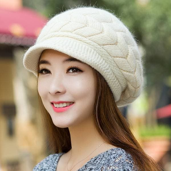 Hot brand autumn and winter knitted cap/arrow hat/wool hat/thickened velvet fashion trend double warm ear protection beret