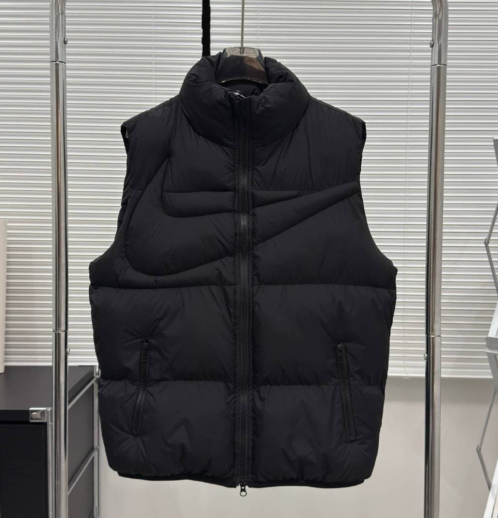 Gilet matelassé sans manches à col montant Nlke pour homme, fermeture éclair intégrale, poches zippées, idéal pour superposer les vêtements.