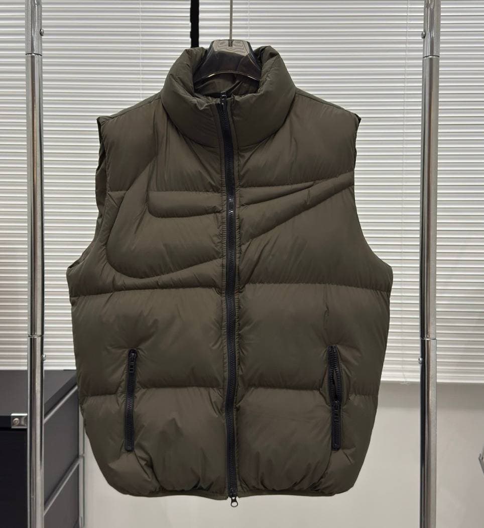 Gilet matelassé sans manches à col montant Nlke pour homme, fermeture éclair intégrale, poches zippées, idéal pour superposer les vêtements.