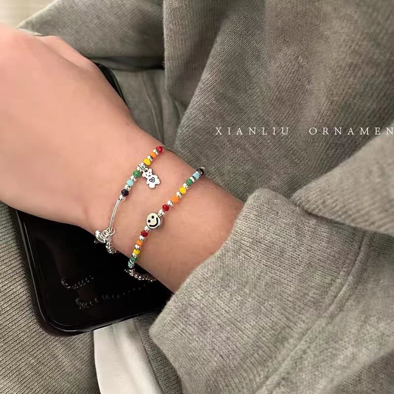 Rainbow smiley bear love bracelet female niche sense handmade beaded elastic rope couple hand jewelry wholesale