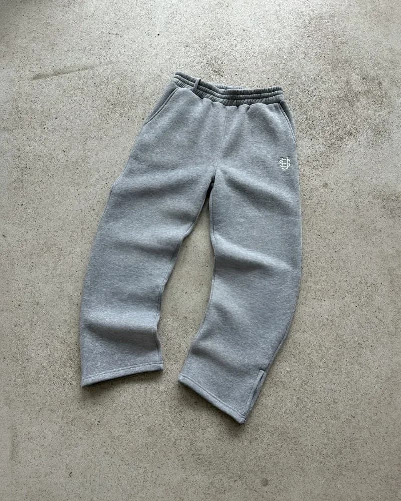 Pantalon de survêtement homme style hip-hop urbain, capuche zippée, manches longues, polyester noir, coupe basique micro-élastique, idéal pour le