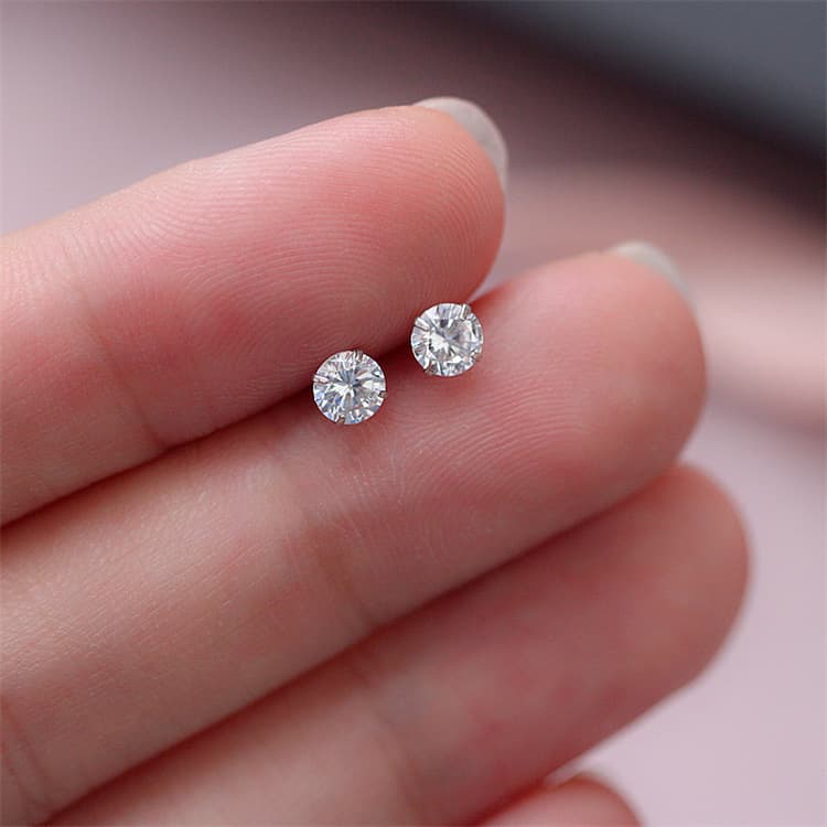 Boucles d'oreilles unisexes en argent pur étincelant, ornées de zircon et de mini diamants blancs.