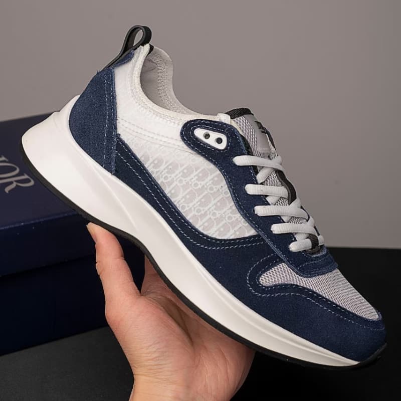 Nouvelles chaussures de course décontractées à imprimé lettre B25 avec brides à bout rond, tendance et confortables pour hommes et femmes.