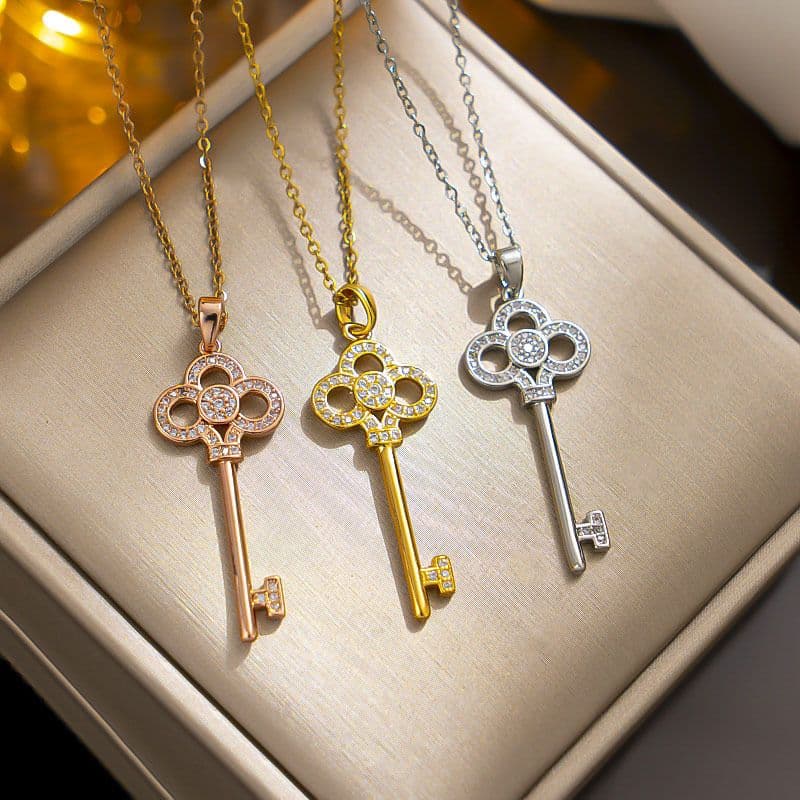 Designer's high-end clover key titanium steel men's and women's necklace with electroplated genuine gold light style