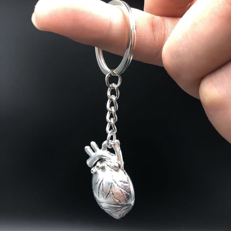Three-dimensional human heart key chain
