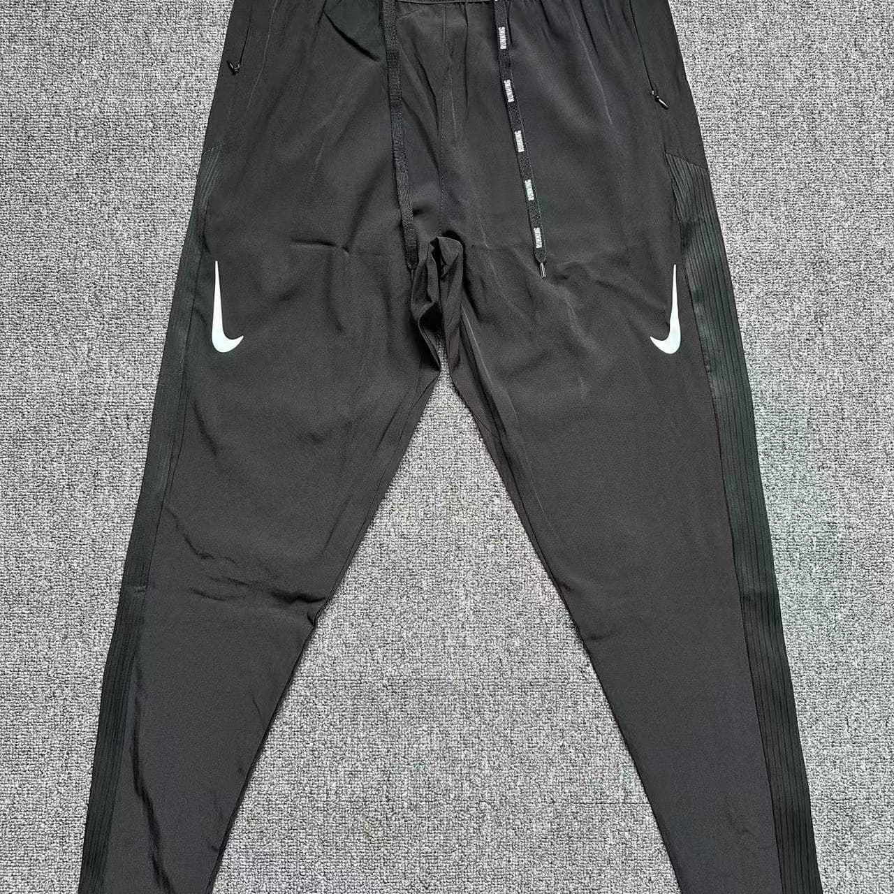 Pantalon de sport à séchage rapide pour homme et femme, respirant, coupe droite, idéal pour la course à pied et le marathon. Fermeture éclair.
