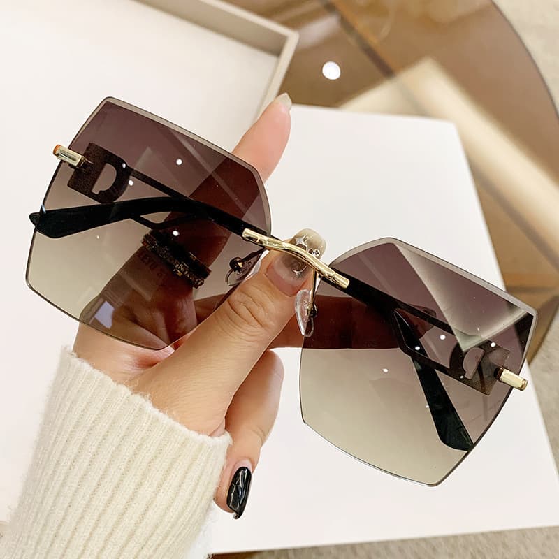 Man Women's trend rimless cut edge fashion driving travel glasses advanced feeling sunglasses