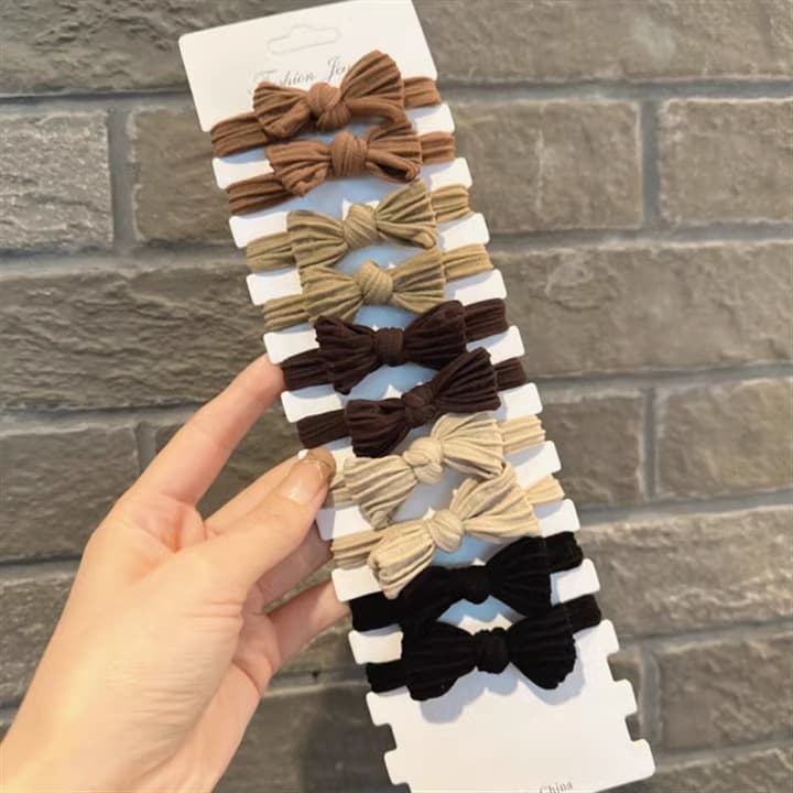Korean version of simple knotted rope, milk coffee color, versatile bow tie, headrope, sweet and high hair band, elastic