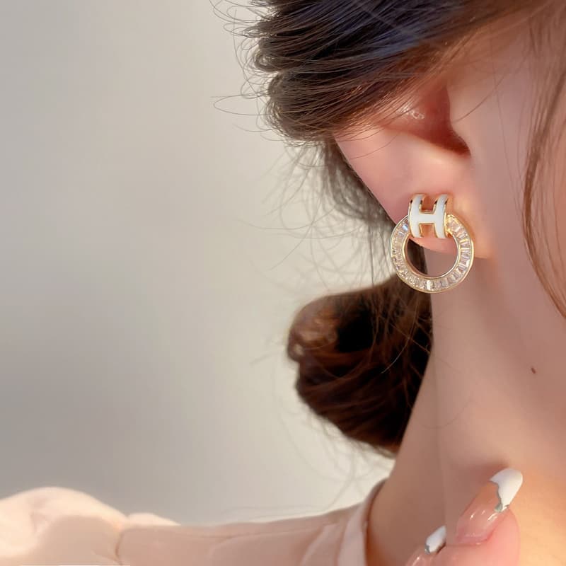Real gold electroplated silver needle zircon letter hollow geometric earrings Ruilifeng stud earrings versatile earrings