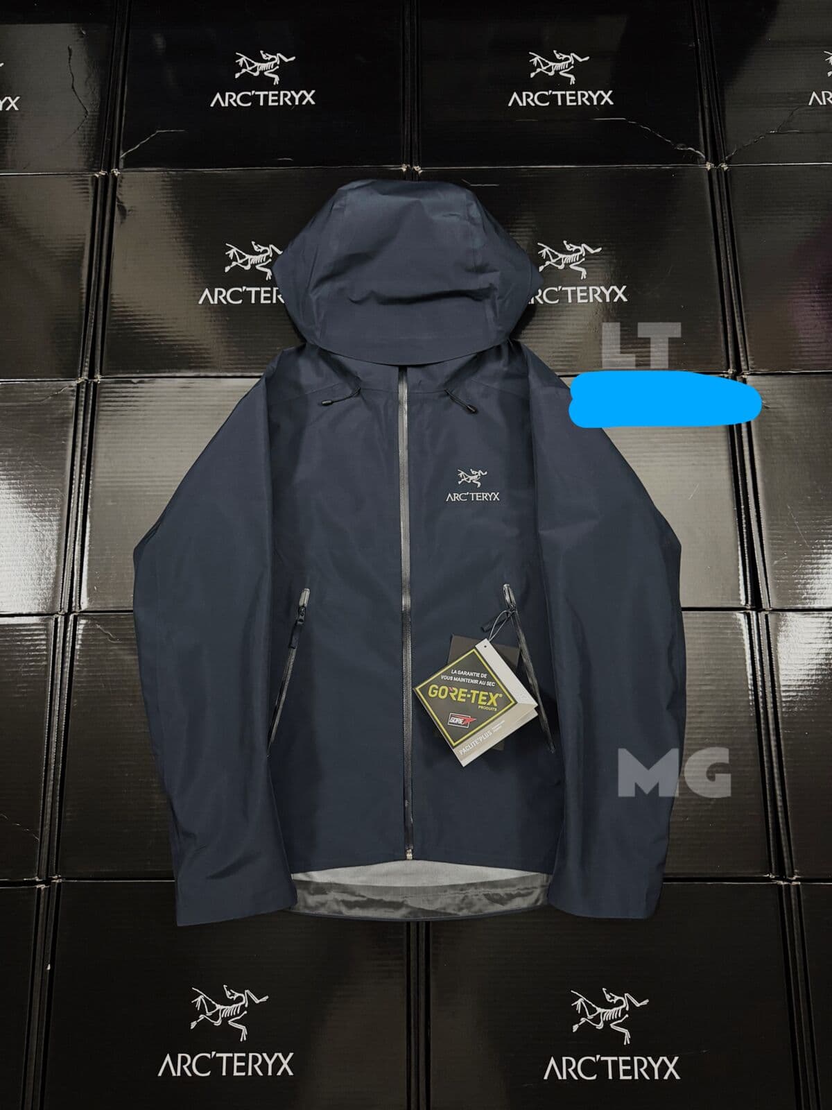 Veste imperméable et coupe-vent à capuche AT-Style pour homme, en tissu GORE-TEX bleu clair, avec poches zippées intégrales, idéale pour la rand
