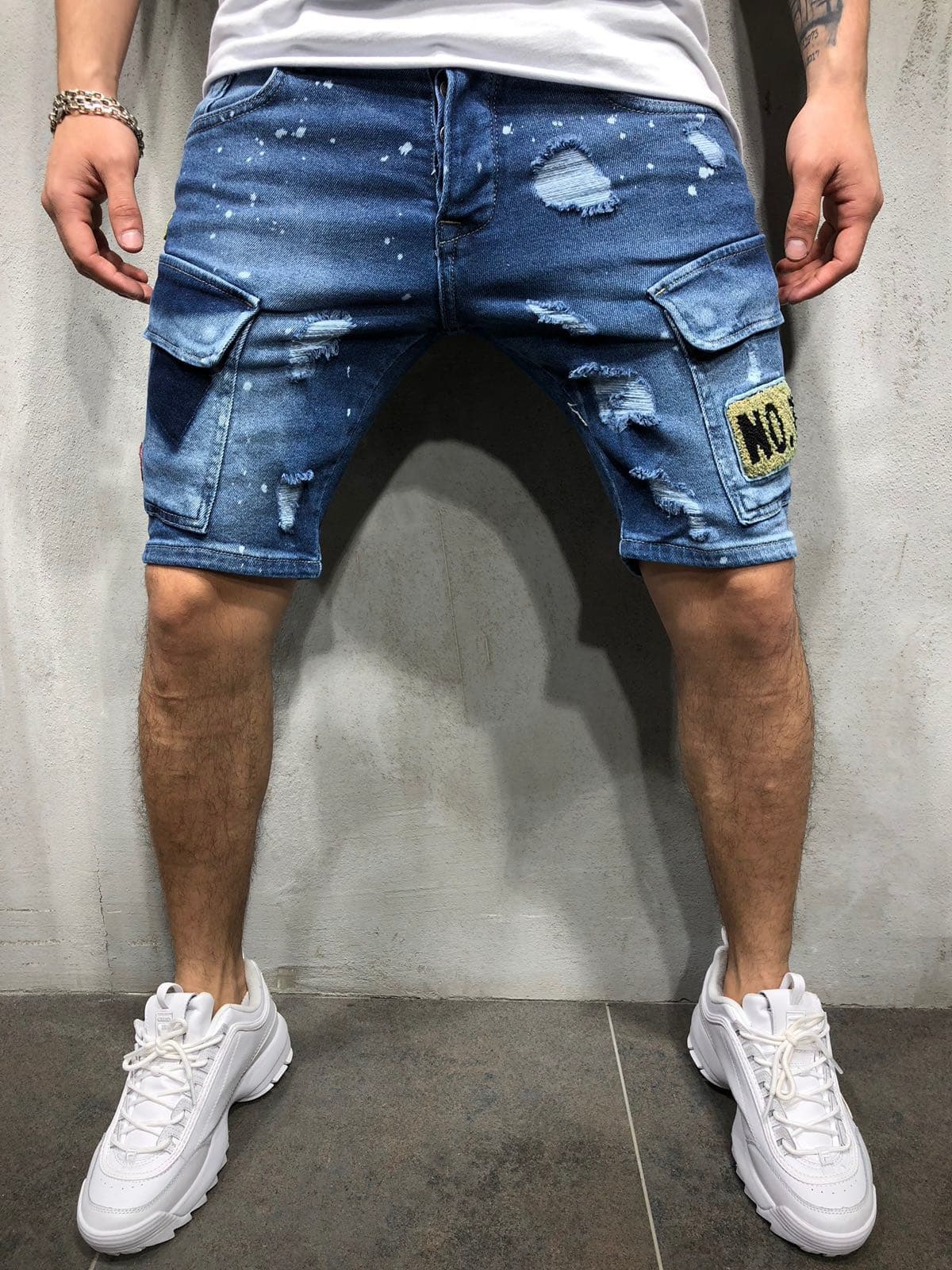 European and American Men's New Jeans Fashion Slim Fit Show Slim Hole Denim Shorts