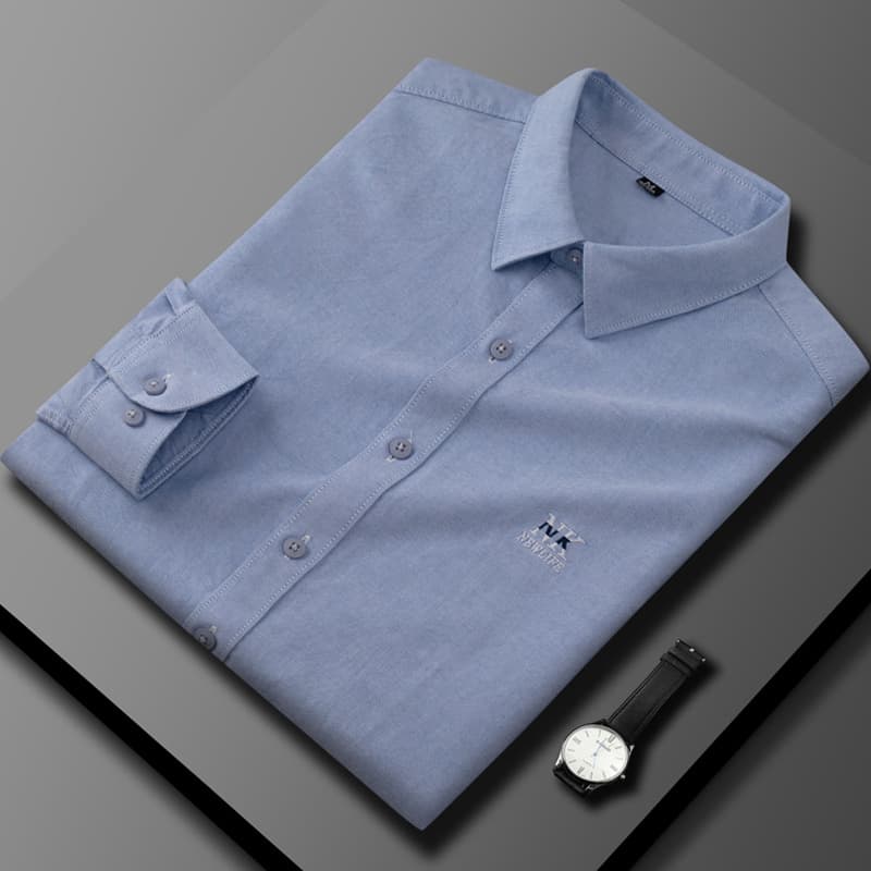 Chemise à manches longues printemps automne nouvelle version coréenne tendance en pur coton pour homme, décontractée et élégante.