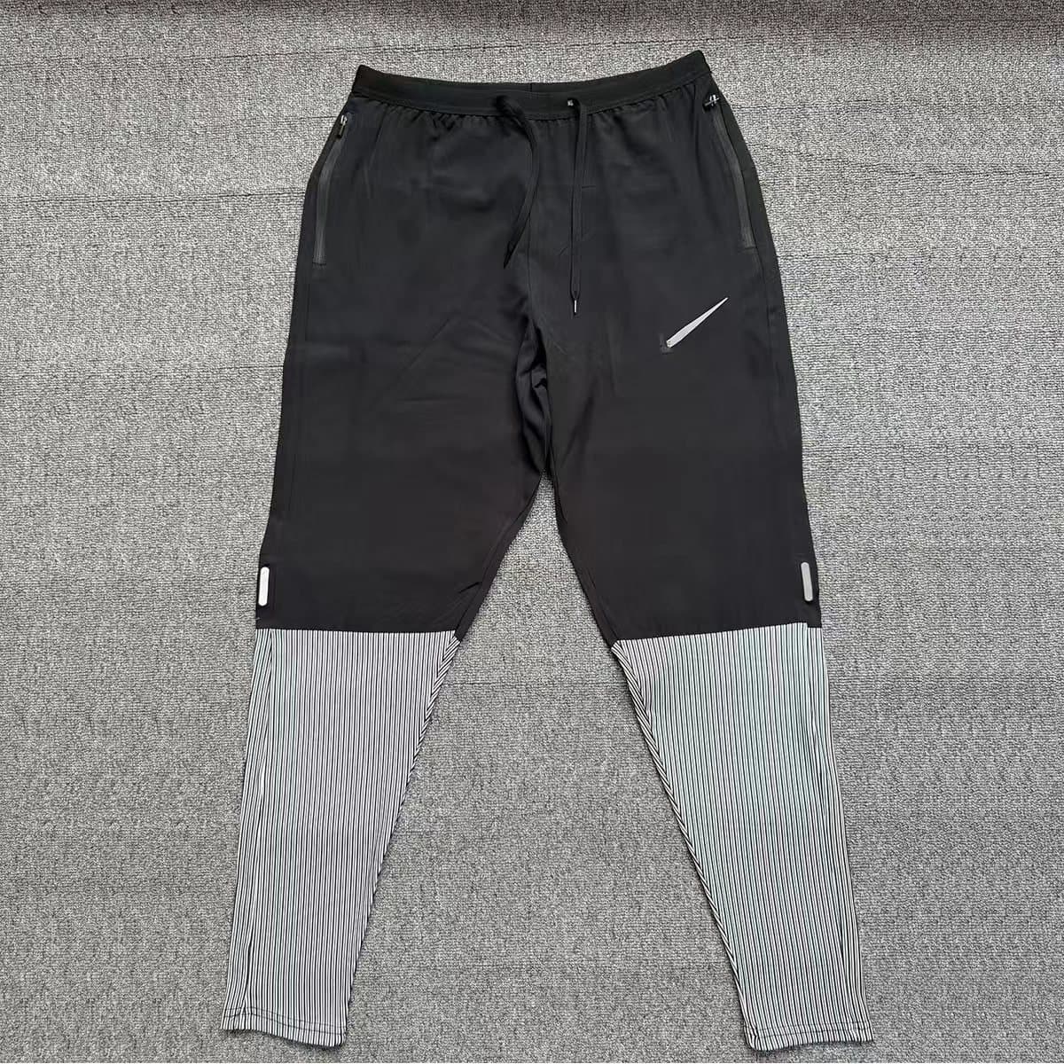Pantalon de sport Elite Multi-Style pour homme, séchage rapide, respirant, coupe ample, patchwork, idéal pour la course en salle.