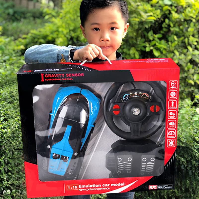 Hand-held Gift Box Steering Wheel Remote Control Car 1:16 Charging Four-way High-speed Car Gravity Induction Electric Toy