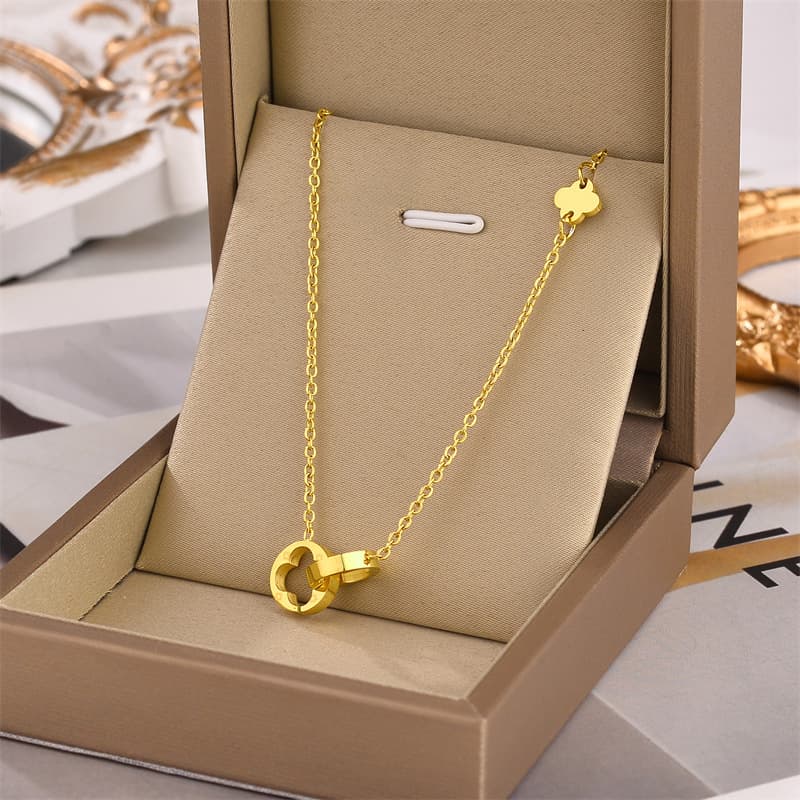 titanium steel double ring fashion versatile double button lucky grass necklace female color preserving headwear