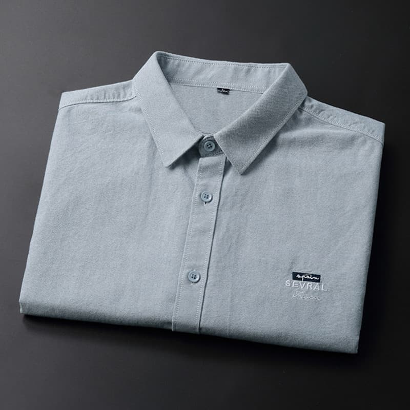 Chemise à manches longues printemps automne nouvelle version coréenne tendance en pur coton pour homme, décontractée et élégante.