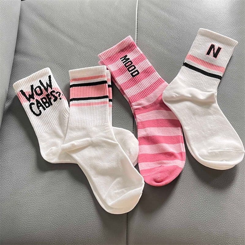 Unisex Socks female long tube ins tide high appearance level Sen department middle tube student white word mother and daughter grow socks female